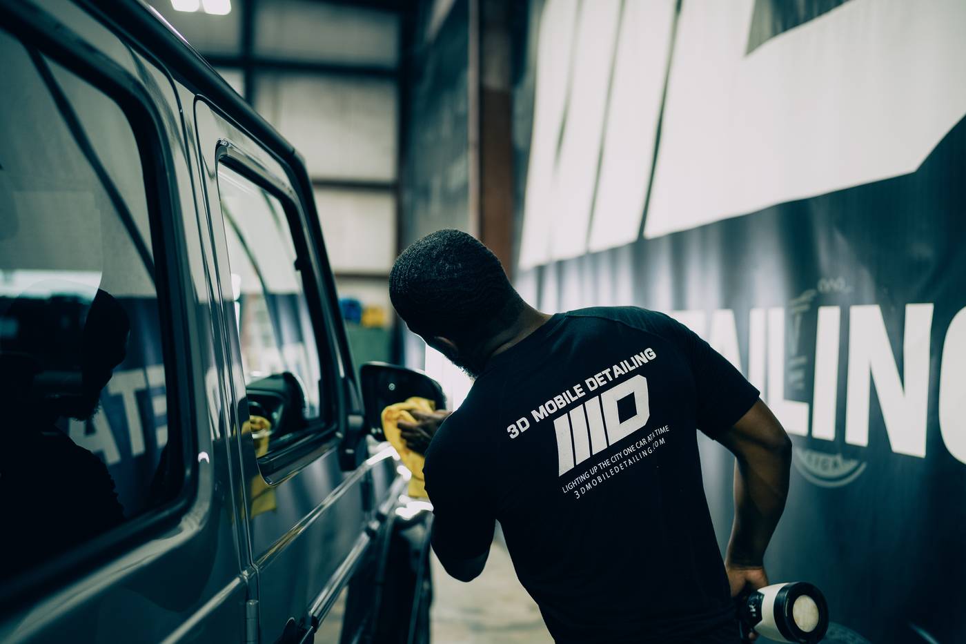 Hand finishing inside the 3D Auto Detailing shop